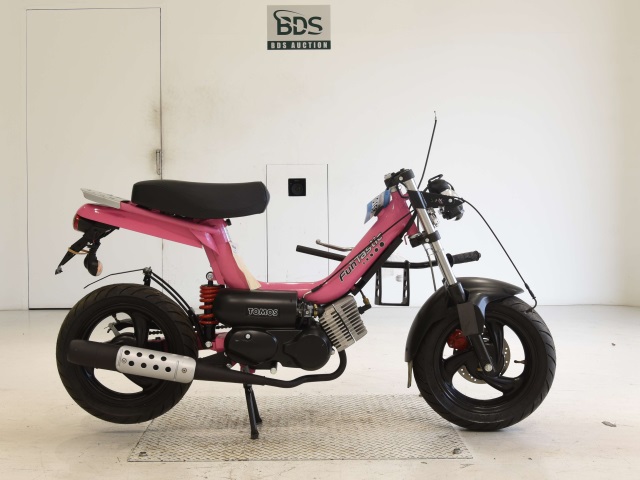 Tomos